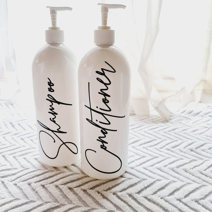 White Pump bottles with black shampoo and conditioner labels. 
